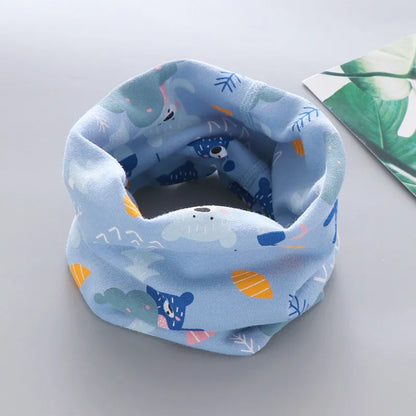Cute baby's neck protector, white with cartoon clouds, for chilly days
