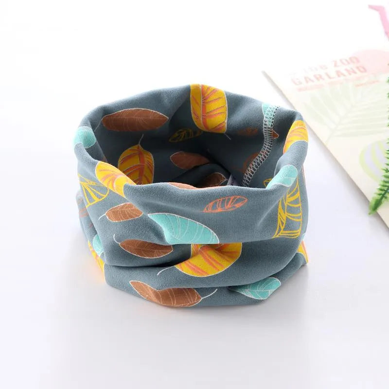 Winter kids neck tube, multi-colored with cartoon robots, ensures warmth and style