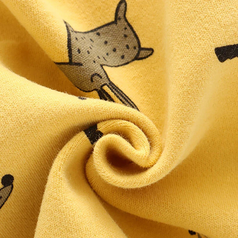 Soft kids neck gaiter, yellow with a giraffe cartoon, a cozy winter accessory
