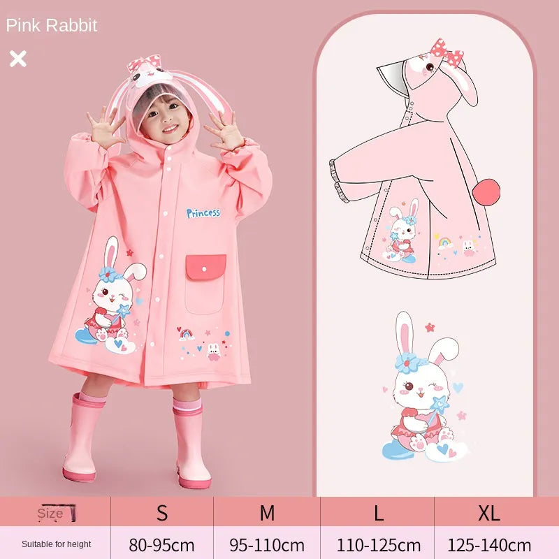 Girl in a pink cartoon raincoat with hood, holding the portable storage bag, active child