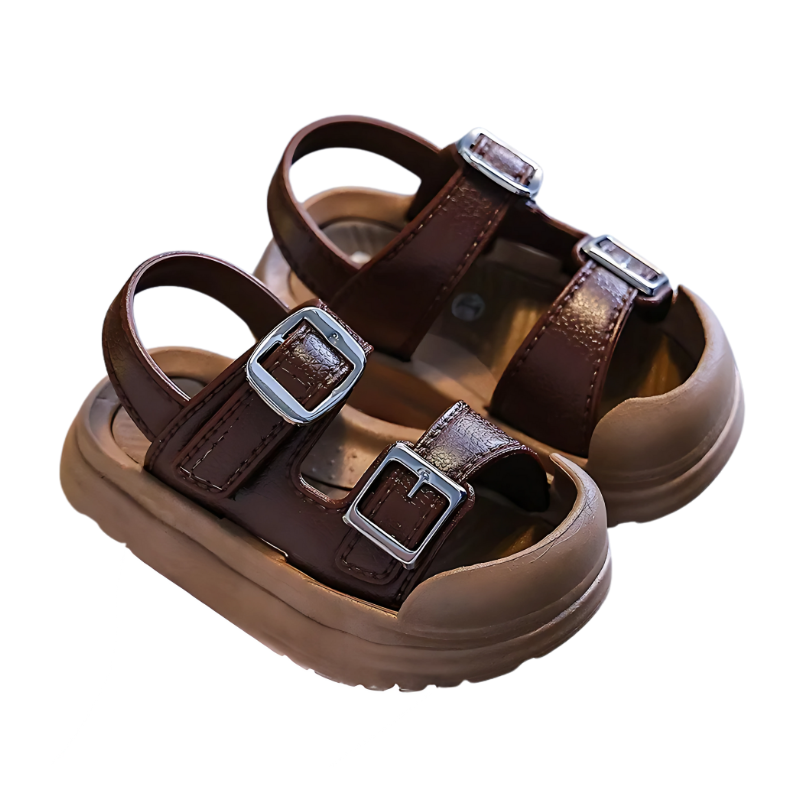 Comfortable kids' black buckle sandals with anti-slip sole, ideal for summer play