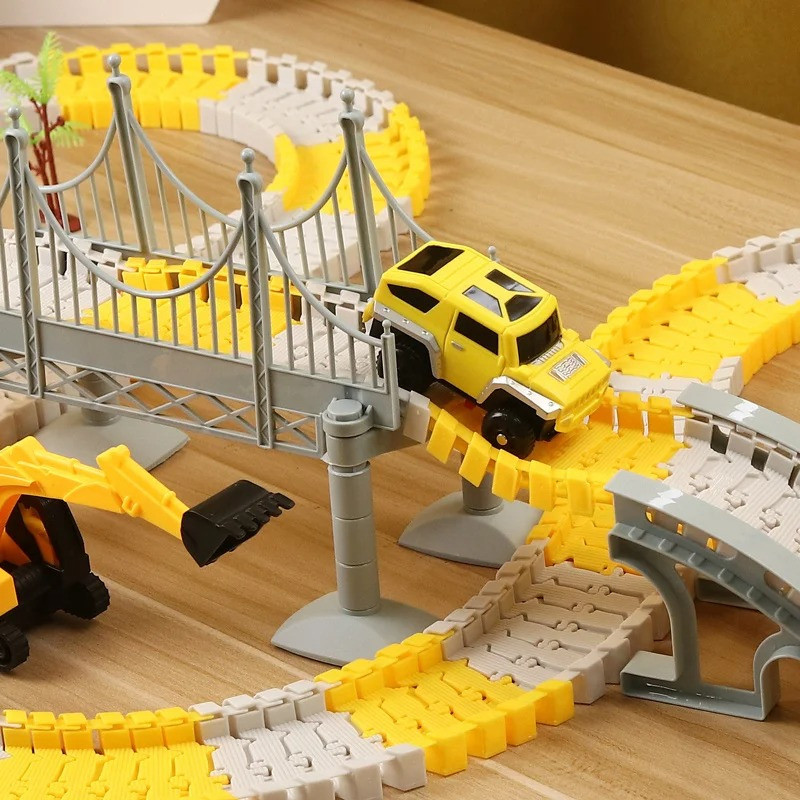 Kids' Constructible Dynamic Race Track Playset with bright orange and blue modular track pieces