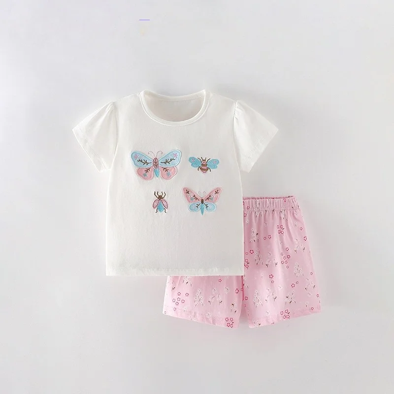 Girls' summer fashion: bright cotton blend top and shorts with fun, vibrant patterns