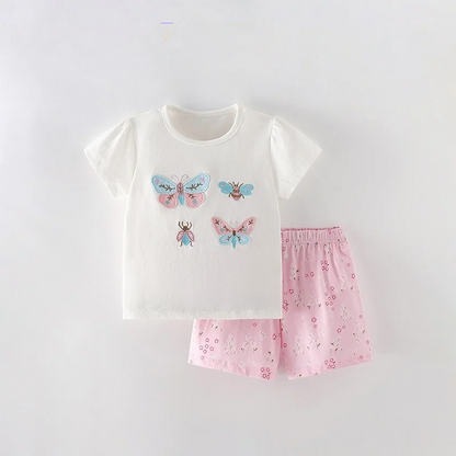 Girls' summer fashion: bright cotton blend top and shorts with fun, vibrant patterns