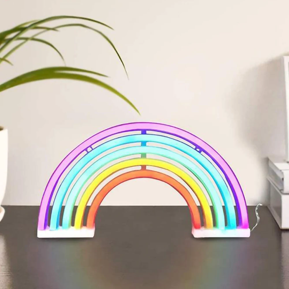 Portable neon rainbow table lamp for kids, USB or battery operated. Adds fun mood lighting to any room.