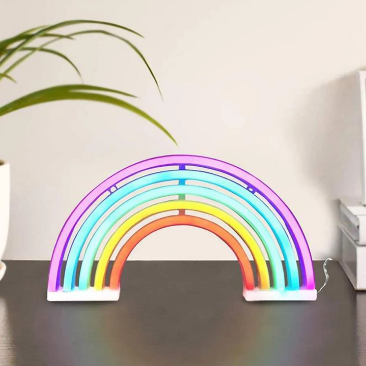 Portable neon rainbow table lamp for kids, USB or battery operated. Adds fun mood lighting to any room.