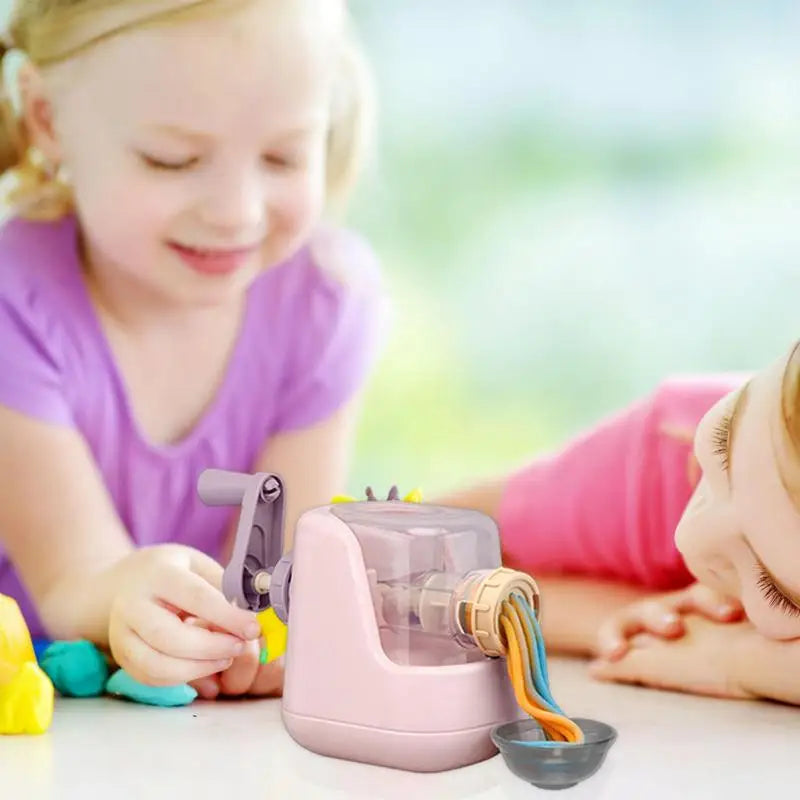 Children playing with the Pasta Maker Playdough Set, crafting colorful noodles and shapes, great for creative play.
