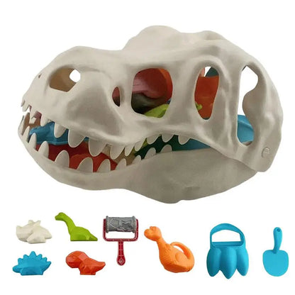 Kids' dinosaur beach sand dig set with red bucket, green spade, and dinosaur molds, perfect for outdoor fun