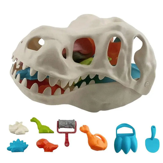 Kids' dinosaur beach sand dig set with red bucket, green spade, and dinosaur molds, perfect for outdoor fun