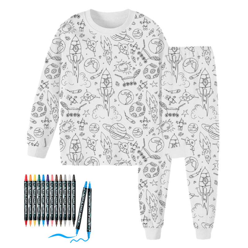 Close-up of a DIY pajama fabric with line art, ready for coloring by kids with provided markers