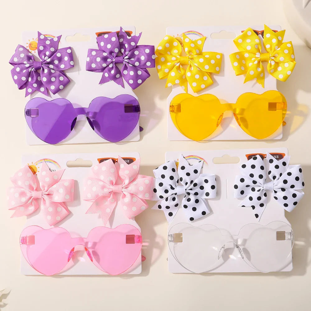 Toddler girl wearing a Dot & Heart Sunglasses Hairpin, colorful kids accessory