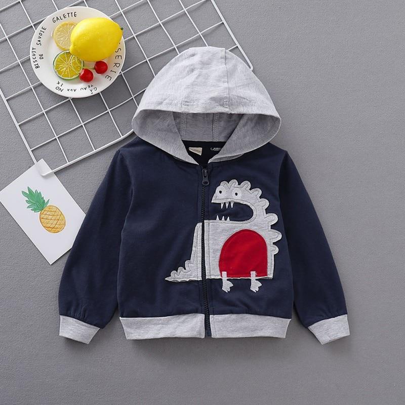 Close-up of vibrant dragon embroidery on a kids zip-up sweatshirt