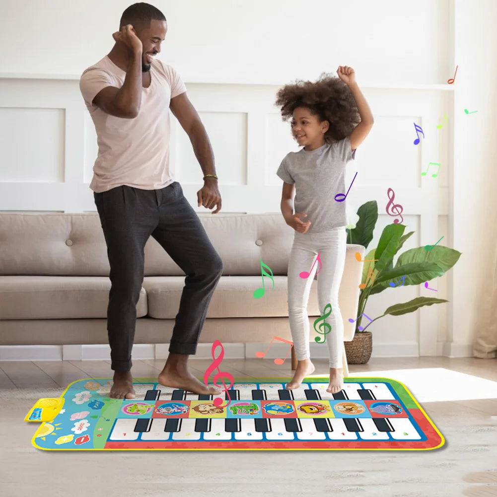 Toddler playing happily on an educational musical play mat, engaging with sound and lights