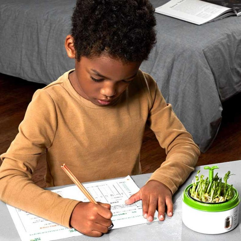 Girl actively engaged with the educational plant growth kit, promoting hands-on science learning