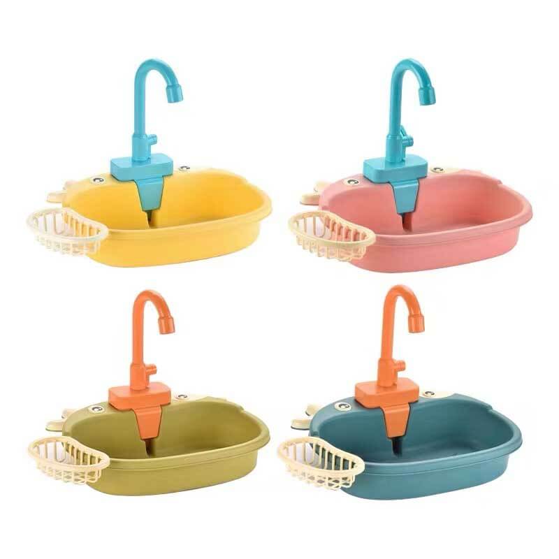 Toddler engaged in pretend dishwashing with the interactive play kitchen sink and running water