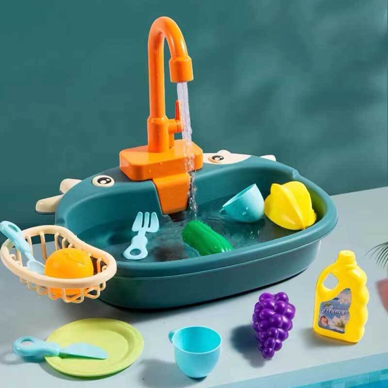 Detailed image of a child's toy kitchen sink set, includes cups, plates, and a brush