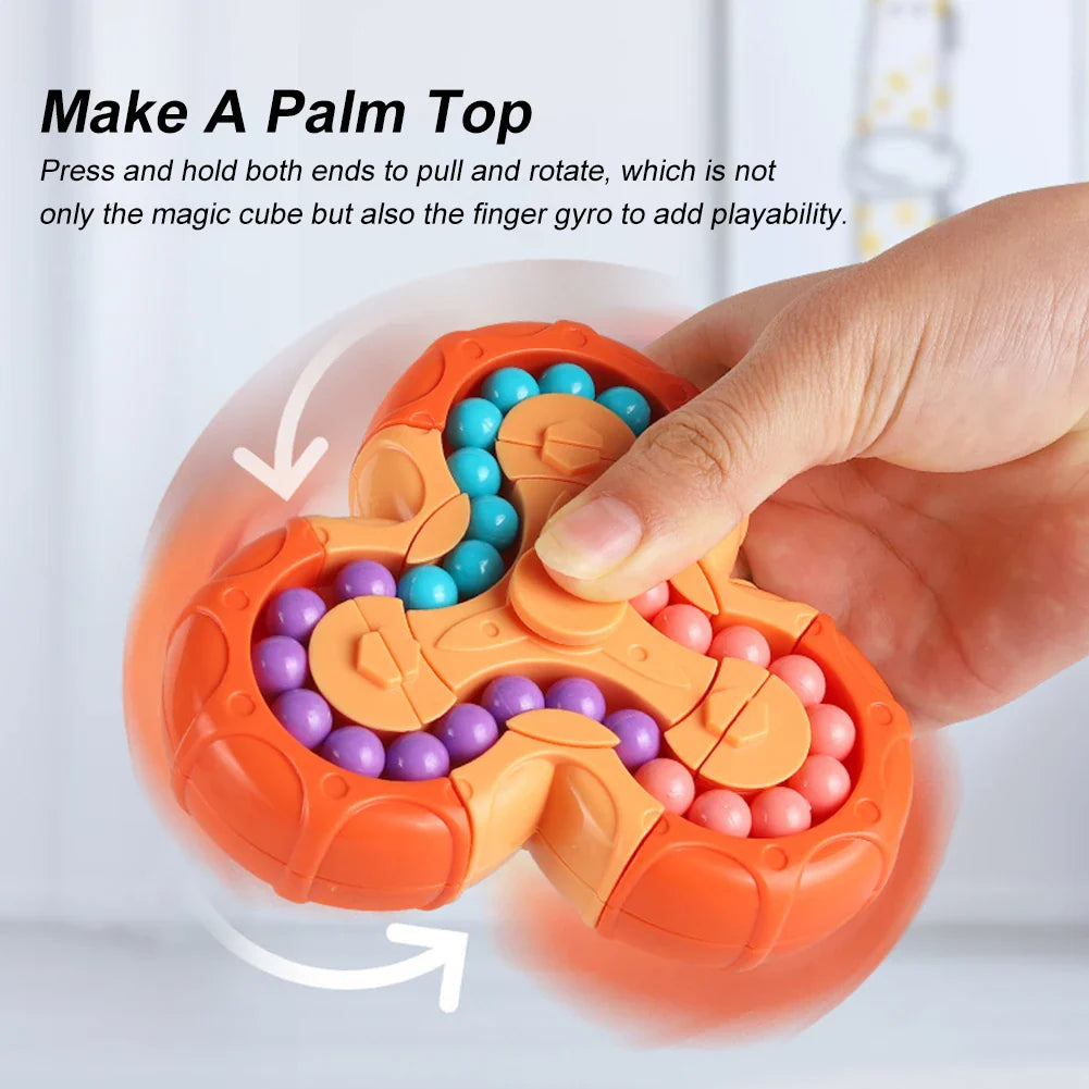 Child's hands playing with a Kids' Educational Rotating Bead Maze Cube Fidget Toy, learning game