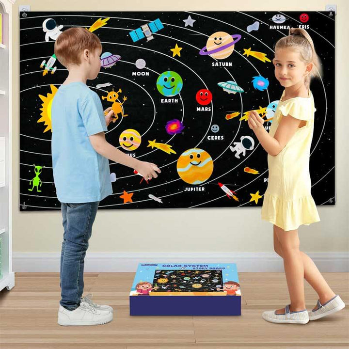 Close-up of a child's hands arranging planet pieces on a felt solar system board, early education toy