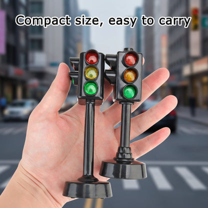 Educational toy set featuring miniature traffic lights, cars, and road signs for children