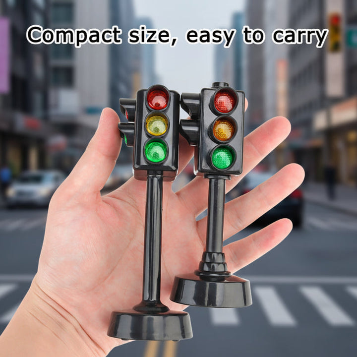 Educational toy set featuring miniature traffic lights, cars, and road signs for children