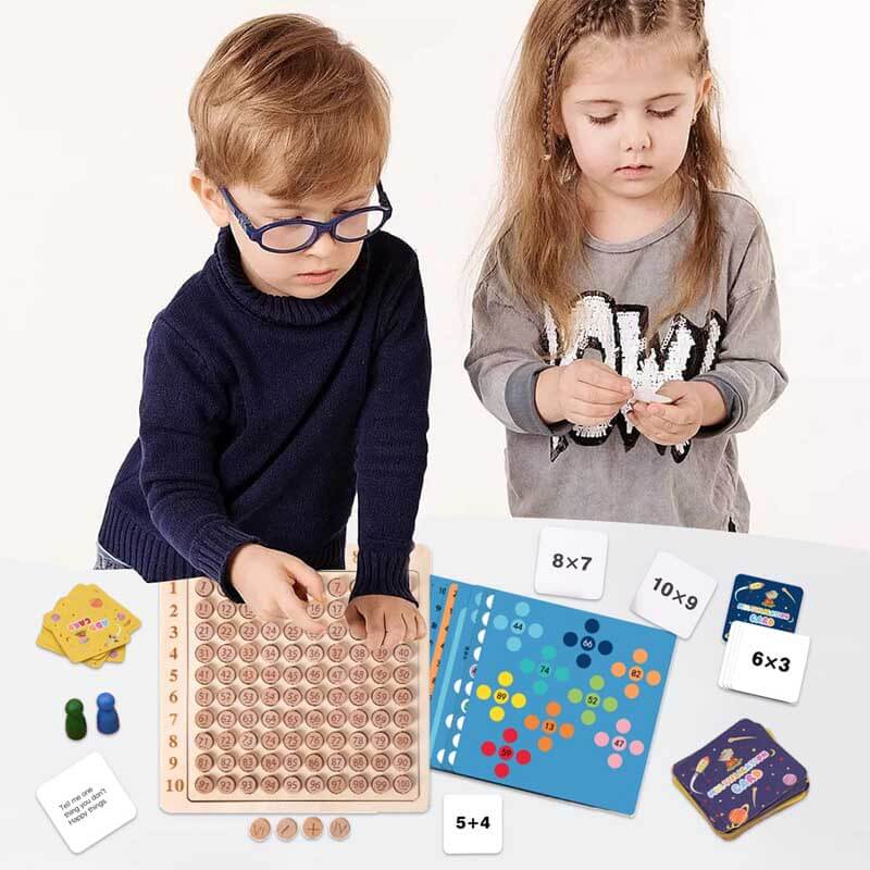 Kids playing with a wooden educational multiplication and addition board game, hands-on math fun