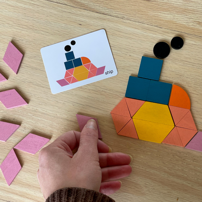 Close-up of a wooden puzzle showing colorful geometric shapes, ideal for kids' learning games