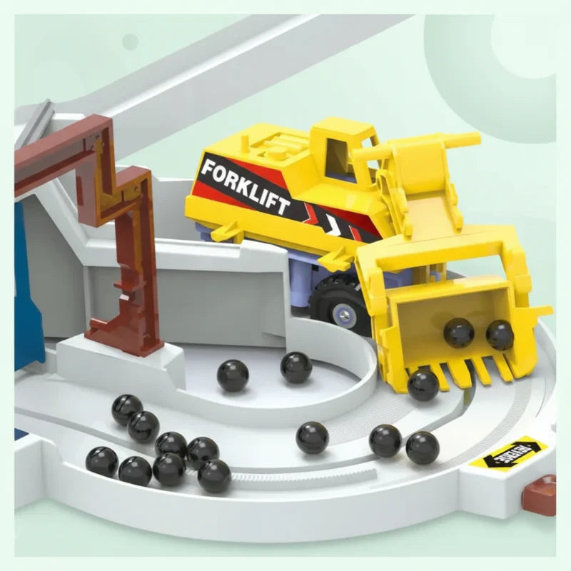 Close-up of a child's hand placing a block on the Electric Construction & Race Track Set, promoting motor skills