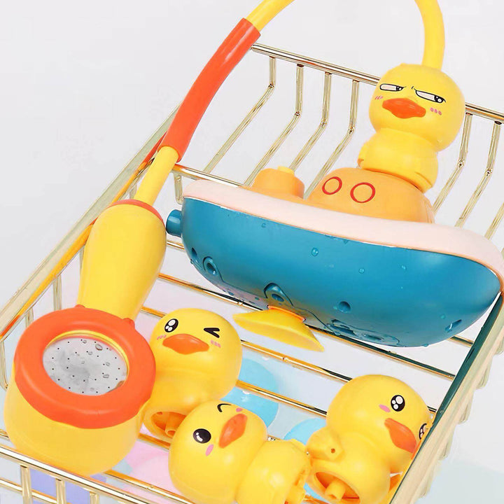 Cute yellow duck electric bath toy with water spray for baby's fun, engaging toddler water play & sensory development.
