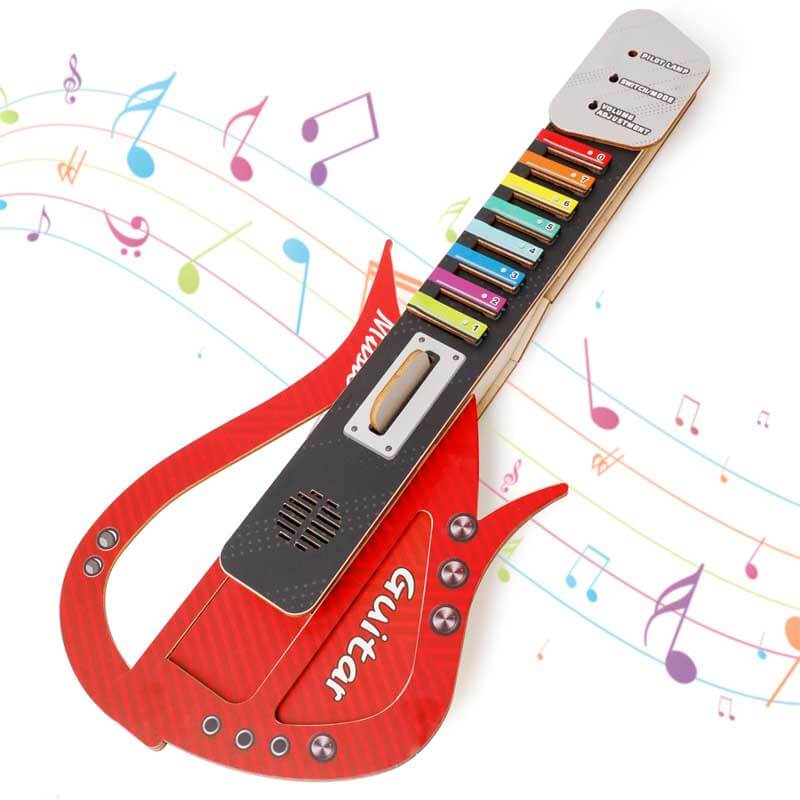 Wooden components and electronic parts of a Kids DIY Play Guitar Kit, perfect for creative children