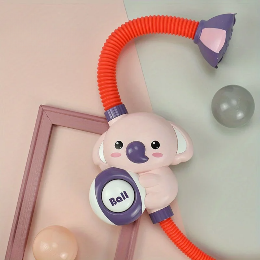 Toddler happily playing with an elephant kids shower bath toy, making bath time fun and engaging