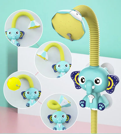 Child playing with elephant faucet bath toy, laughing as water sprays, a key bathtoy
