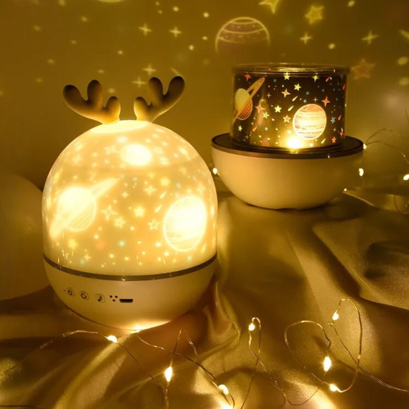 Kids' enchanting star projector night light casting nebulae & stars, perfect for children's room decor & sleep aid