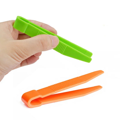 Kids' fine motor learning tweezer set for developing preschool hand-eye coordination with colorful clips
