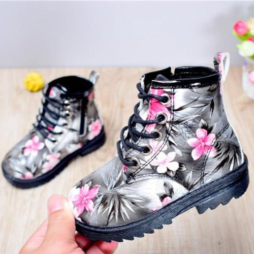 Kids' floral combat boots, black with vibrant flower pattern, polyurethane leather, lace-up style