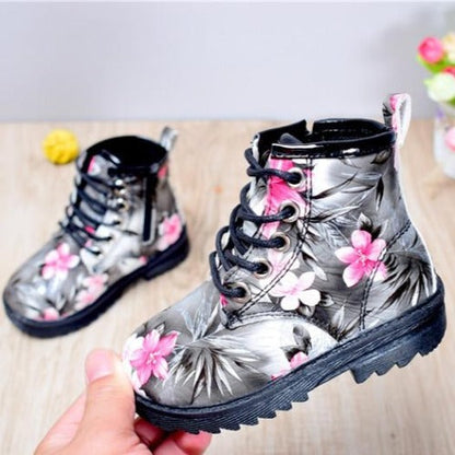 Kids' floral combat boots, black with vibrant flower pattern, polyurethane leather, lace-up style
