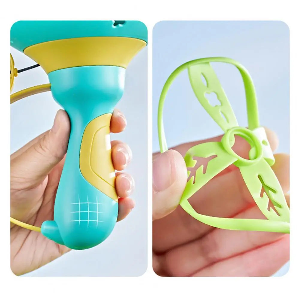 Active game fun: Kids' Flying Disc Launcher with a launched disc mid-flight in a park