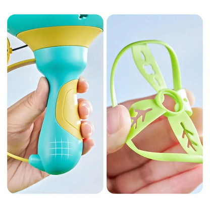 Active game fun: Kids' Flying Disc Launcher with a launched disc mid-flight in a park