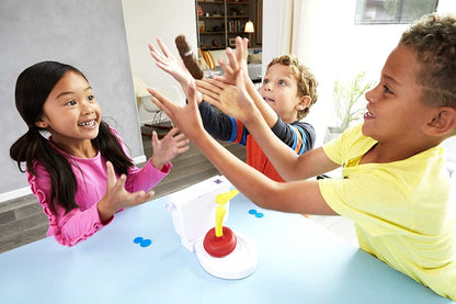 Close-up of the Flying Poop Game with flying poop pieces, emphasizing interactive skill game components.