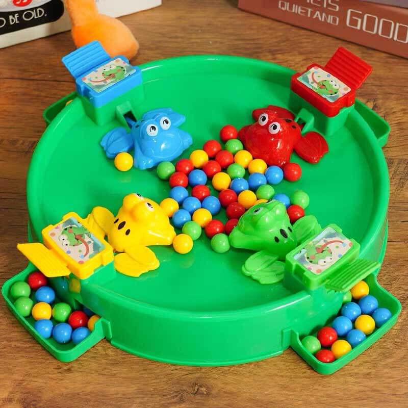 Children playing the Frog Tongue Board Game, showing kids in action, interactive reaction game.