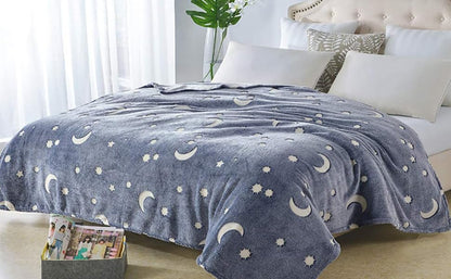 Kids' glow blanket featuring sun & moon, a soft and luminous throw for bedtime comfort