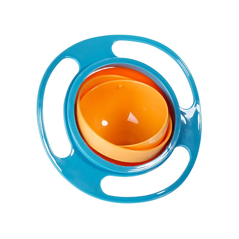 Toddler holding a red spill-proof gyroscopic snack bowl, keeping snacks contained.