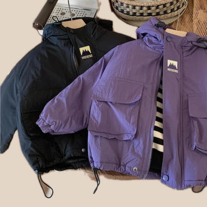Green kids' hooded windbreaker, lightweight and easy to pack, great for play