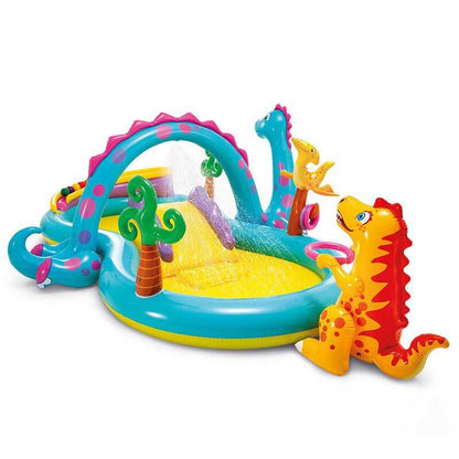Children playing in a colorful inflatable splash sprinkler pool, enjoying outdoor fun.