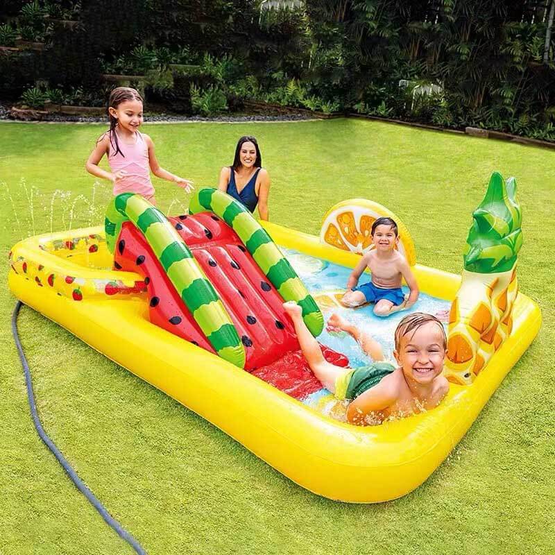 Inflatable backyard water park pool with integrated sprinklers, ideal for summer play.