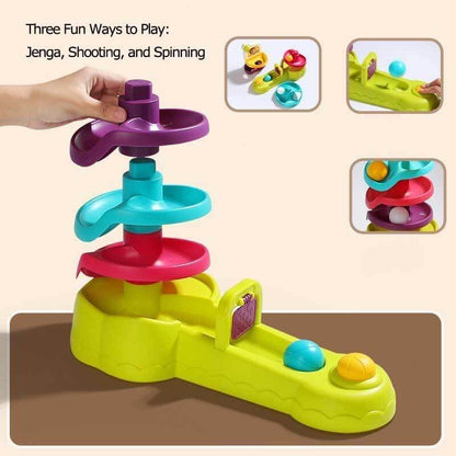 Toddler joyfully playing with an educational ball shooting & spinning activity toy, a great gift for kids