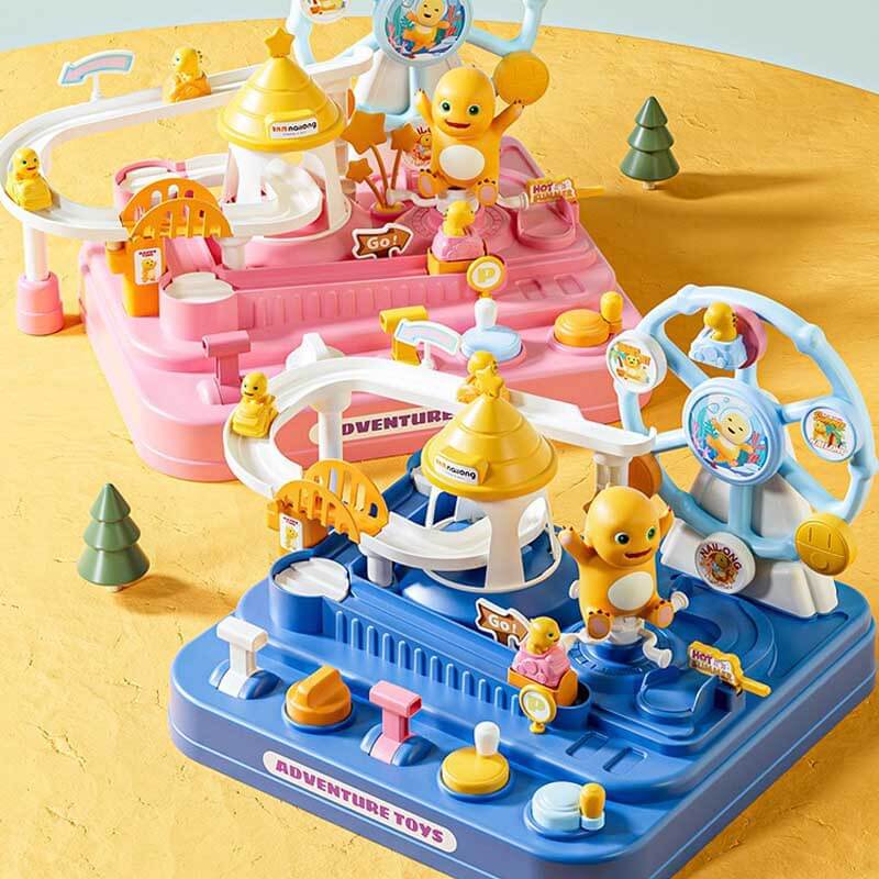 Preschooler exploring a gravity-powered dino playset with toy cars on an adventure track