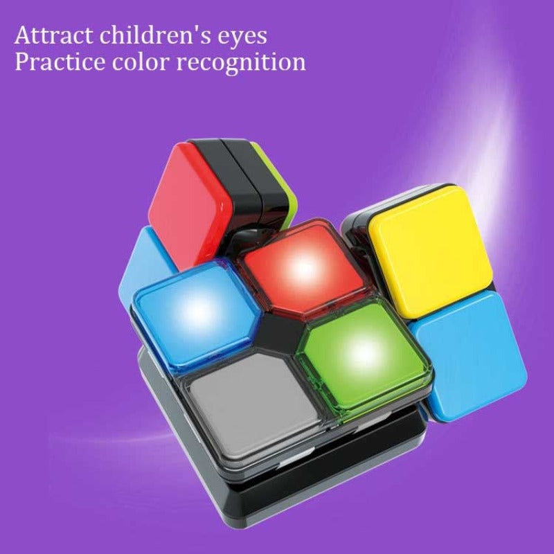 Close-up of a child playing with an electronic Rubik's Cube, a colorful, interactive puzzle toy