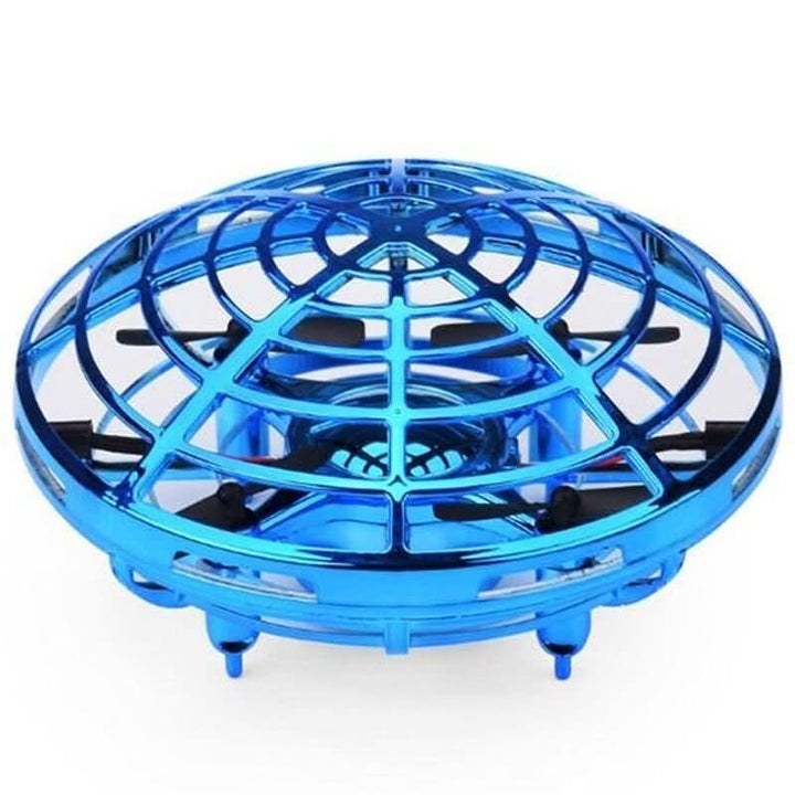 High-tech hand-controlled UFO drone for kids, interactive sensors, rechargeable flying toy, great indoor/outdoor fun.