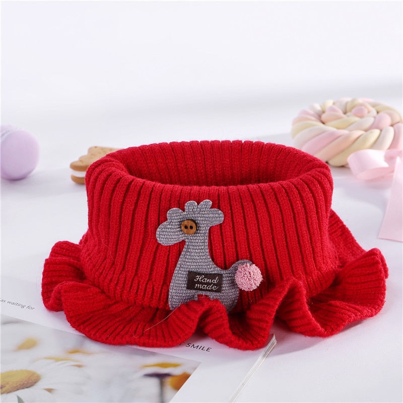 Soft knit neck gaiter for children, featuring a decorative lace edge, perfect for winter essentials