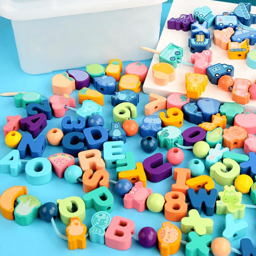 Kids lacing beads set with colorful wooden shapes and strings, enhancing fine motor skills and creative play.